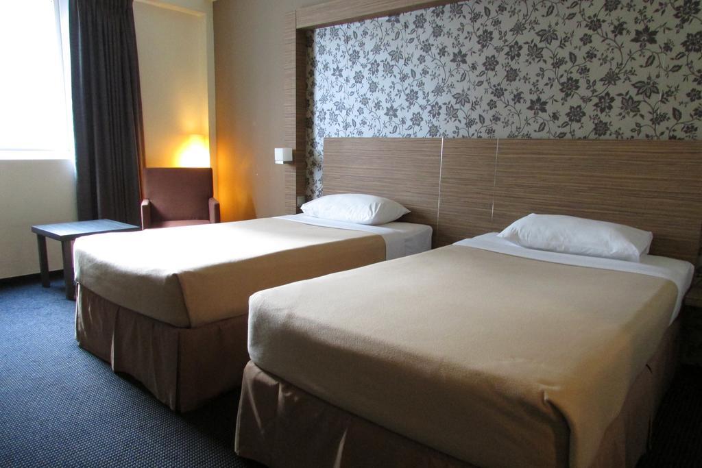 Strand Hotel Σιγκαπούρη Δωμάτιο φωτογραφία