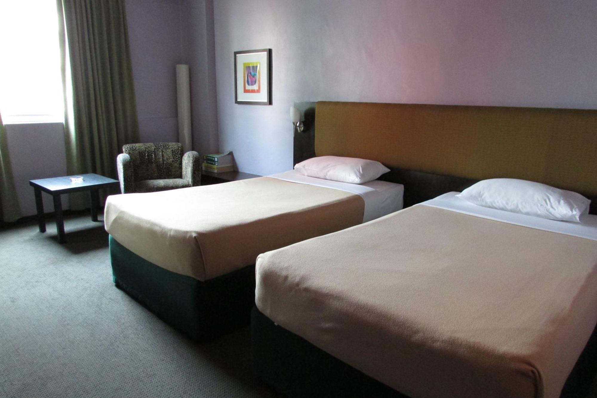 Strand Hotel Σιγκαπούρη Δωμάτιο φωτογραφία